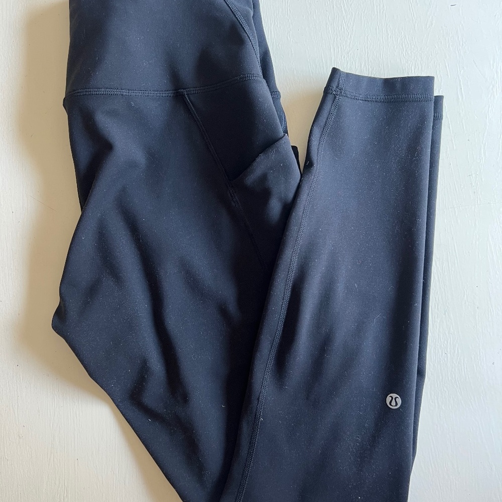 Lululemon wunder train high rise with pockets 28”